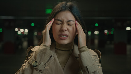 Asian unwell unhealthy sick woman suffer pain headache painful head migraine cramp tension ill...