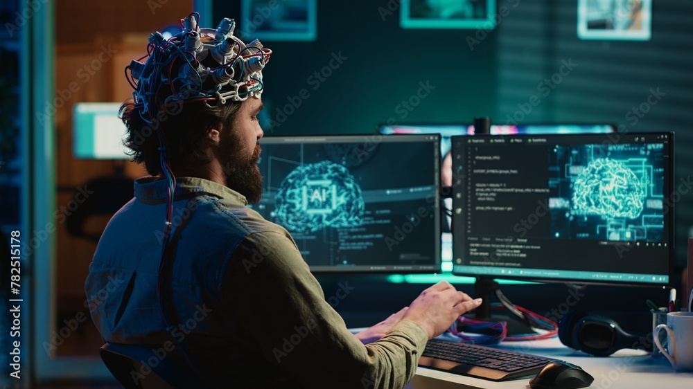 Poster man with eeg headset on writing code allowing him to transfer mind into computer virtual world, beco