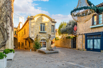 A picturesque medieval stone house in the historic La Cite' de Carcassonne, inside the fortified...