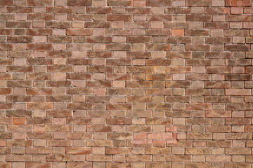 Brick wall textures create a pattern that extends horizontally and vertically along the wall. The...