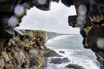 View from a hole in Dunluce Castle, Northern Ireland