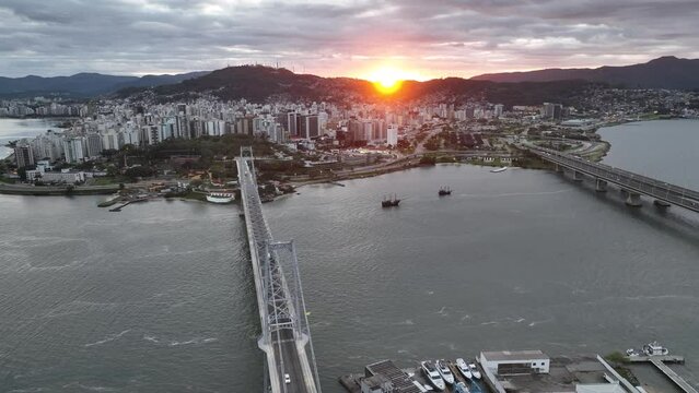 Florianopolis Capital Of Santa Catarina at Brazil. Aerial image taken with a drone of the Hercilio Luz Bridge during sunrise.