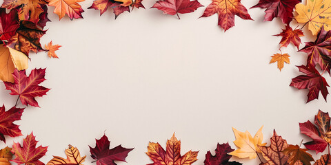 Fototapeta premium Frame of colorful autumn leaves, white background.