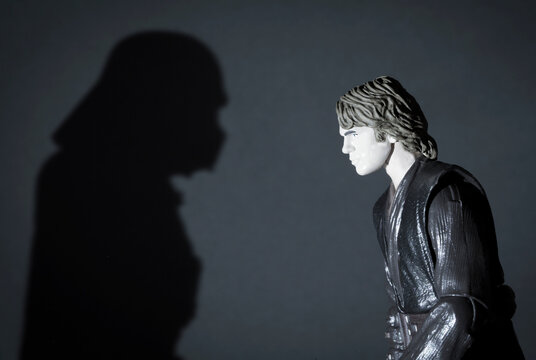 NEW YORK USA, APR 26 2018: Anakin Skywalker with shadow of his future self and the dark side of the Force, Sith Lord Darth Vader from Star Wars - Hasbro Black Series 6 inch action figures