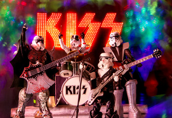Fototapeta premium NEW YORK USA, JUNE 17, 2018: Star Wars Stormtroopers as the Rock band KISS performing on stage using action figures