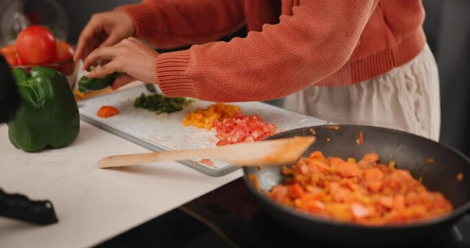 Person, hands and cooking for recording vlogging as content creator for teaching, online class or camera. Chef, vegetables and home meal in kitchen for nutrition tutorial, recipe or subscription