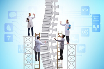 Medical concept with doctors and spine