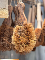 brown brush with wooden handle