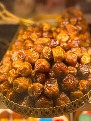 kurma, dates in tray with blurred background