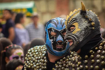 Stickers meubles Carnaval Men with masks in Catrinas parade in Mexico