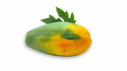 Ripe papaya placed against a white background