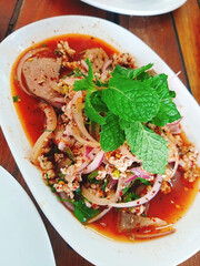 thai spicy minced pork salad with spicy pork