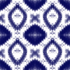 Indigo shibori tie dye seamless pattern watercolor painted indigo circle elements on a white background Abstract colored texture printed for textile, fabric, wallpaper, wrapping paper,batik,cloth.