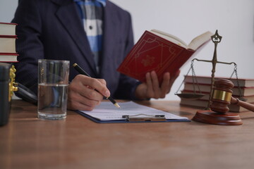 Male lawyer, skilled in jurisprudence, navigates legal matters, drafting contracts, advising...