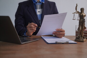 Male lawyer, skilled in jurisprudence, navigates legal matters, drafting contracts, advising clients, representing in court. Law ensures justice, balancing rights and responsibilities