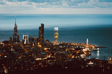 Amazing panoramic view of Batumi city skyline in blue hour day to night. Georgia resort Batumi 2022