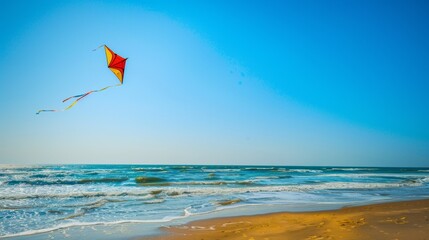 A colorful kite soaring high in the clear blue sky, casting a playful shadow on the beach below