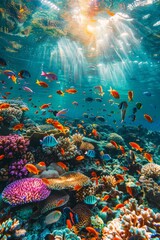 Fototapeta na wymiar A vibrant coral reef teeming with colorful fish, sunlight dappling through the crystal-clear water