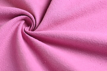 pink cotton texture color of fabric textile industry, abstract image for fashion cloth design background