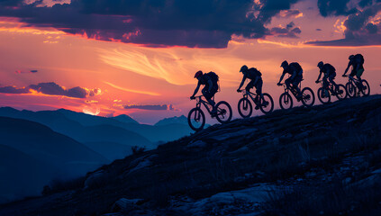 Mountain Bikers on Rocky Ridge at Dusk