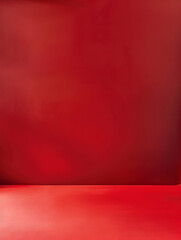 A red wall with a red floor. The room is empty and the red color gives it a warm and inviting atmosphere