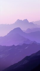 A hazy purple mountain range peaks in the distance. Wallpaper. Background.