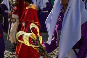 Cucurucho con ramo en Antigua Guatemala, Guatemala. - obrazy, fototapety, plakaty