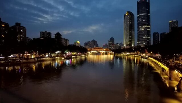 Anshun Bridge in traditional architecture style across the Jin River at twilight  in Chengdu, Sichuan, China.