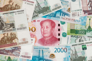 Chinese yuan and Russian ruble banknotes. 