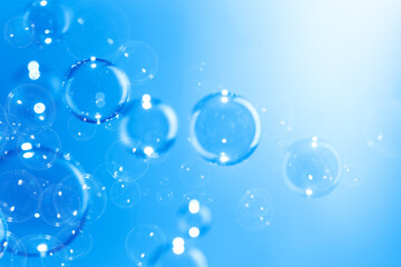 Beautiful Transparent Shiny Blue Soap Bubbles Background. Celebration Festive Backdrop. Freshness Soap Suds Bubbles Water. Abstract Blue Textured Background.	

