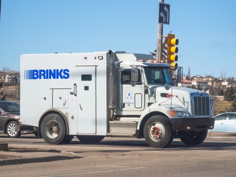 Calgary, Alberta, Canada. Apr 11, 2024. A bullet-resistant armored Brinks truck, a provider of security services to banks, retailers, governments, mints and jewelers.