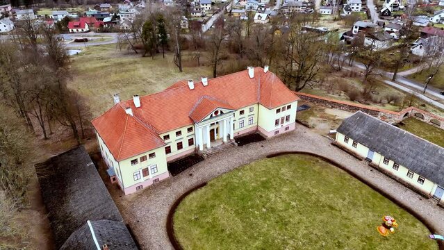 Durbe Castle (Durbes Pils) Near The Tukums Houses In Zemgale, Latvia. - aerial tiltup shot