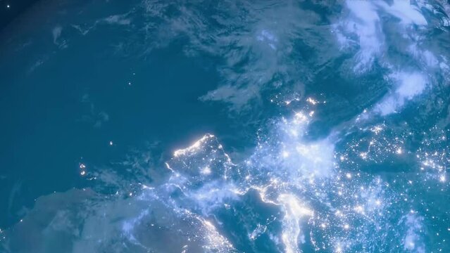 Earth spins into view, showcasing city lights from Italy to China, revealing humanity's global presence