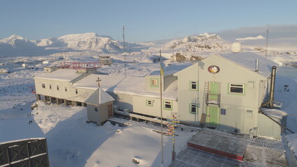 Vernadsky Base - South Polar Antarctic Station Aerial View. Ocean Coast Open Water Surface. South Pole Settlement Base Landscape Drone Flight © mozgova