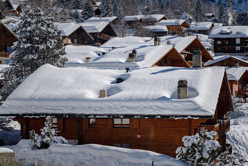 The gentle snow covering the brown houses makes you feel warm and happy