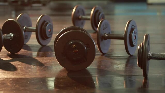 Rows of dumbbells in the gym equipment in the sport gym