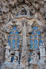 The exterior facade of the Sagrada Familia, in Barcelona, Spain.