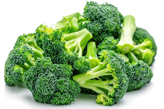 A close-up of a bunch of fresh, green broccoli florets, isolated on a white background, showcasing their vibrant color and crisp texture.