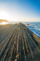 Sunset view of the landscape at beach in Zumaia, Basque, Spain.