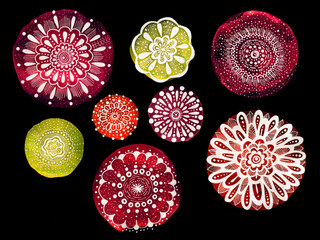 Set of decorative flowers isolated on black. Circles of different sizes and colors. Filled with various ornaments in white. Lines, dots, petals. Pink, red, yellow colors of various shades. Watercolor.