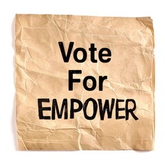 Election Day concept - Vote for Empower written text on brown note paper.