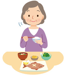 食事をする高齢者女性　介護　健康