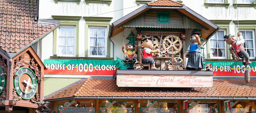 Cuckoo clock with bears at a shop in the Black Forest, Triberg in Germany, traditional craft, vintage wood carving, 30.03.2024