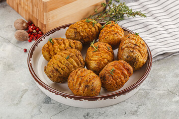 Baked baby potato with thyme