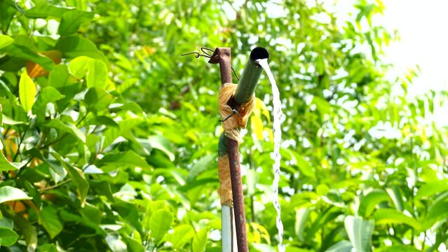 Water is flowing from pipe, out door Chiangmai Thailand