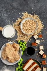 Soy products  on black background. Vegan healthy food
