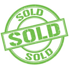 SOLD text written on green stamp sign
