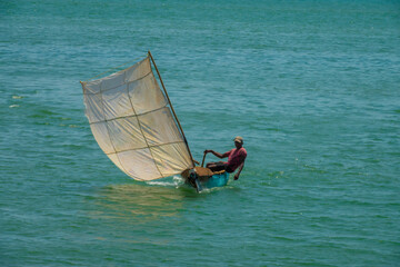Fishing boats with improvised canvas made of reused material São Tomé, São Tomé and Principe...