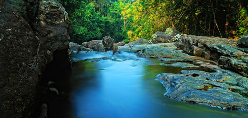 Naklejka premium waterfall in the forest