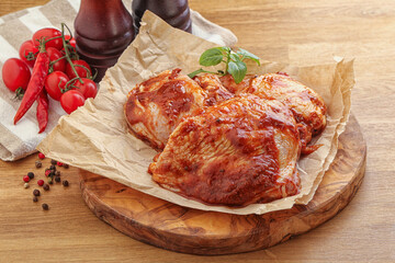 Marinated chicken leg in tomato sauce